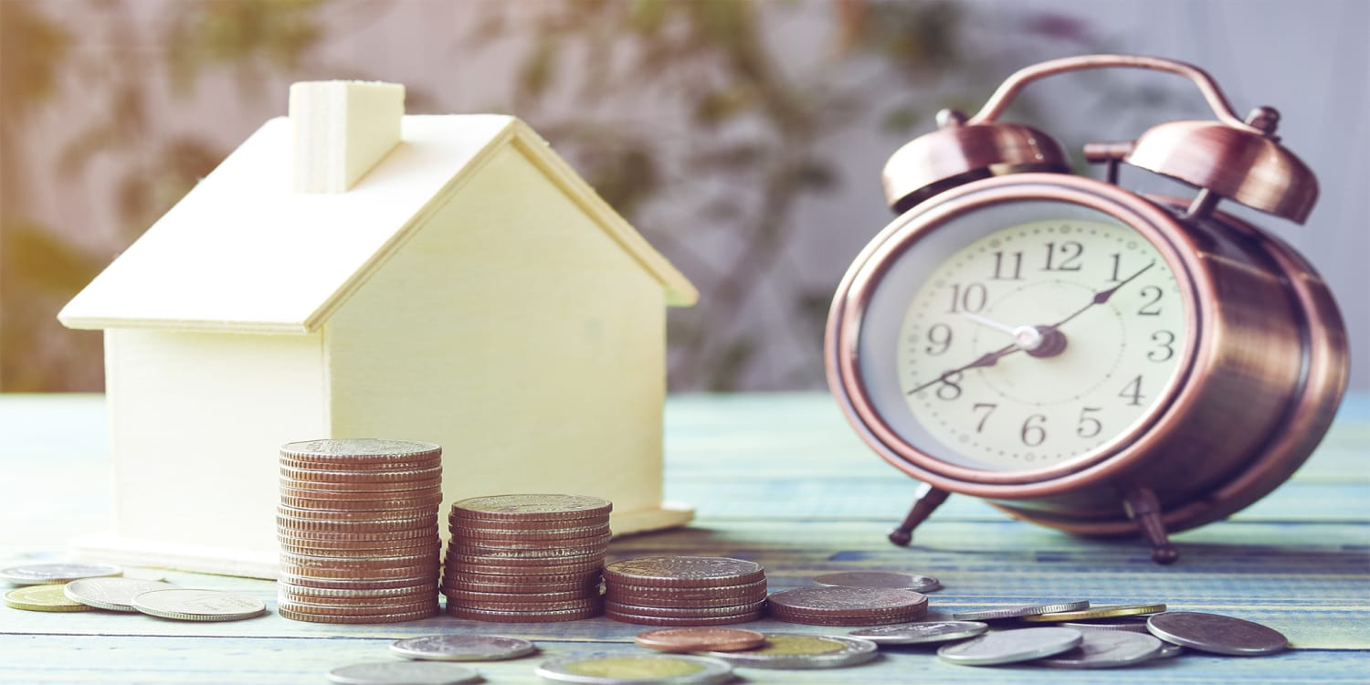 Alarm clock and house, fastest way to sell a house concept